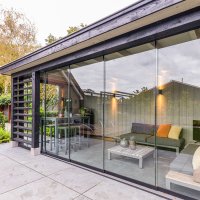 01-project-glasschuifwanden-houten-buitenverblijf-visser-verandas